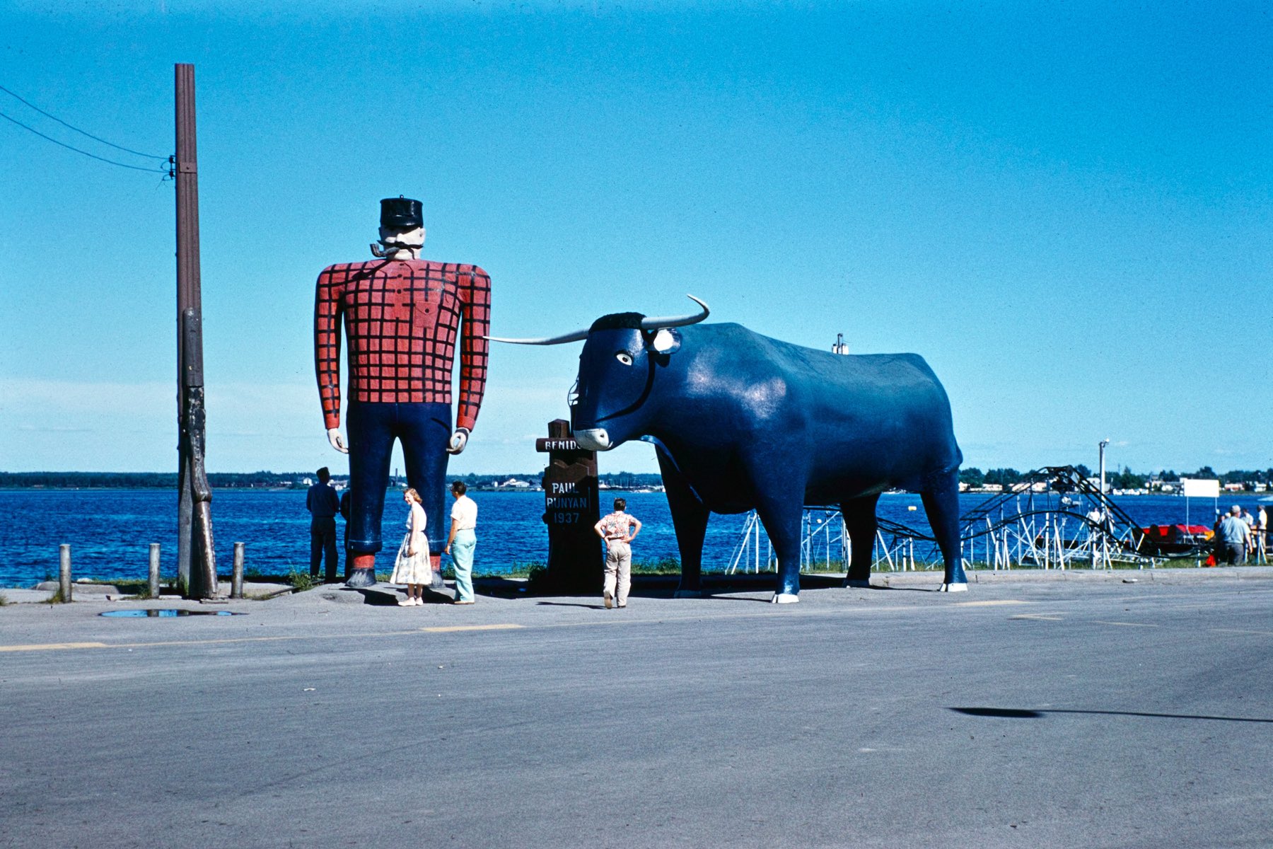 Tourists stare in awe at the size of our national hero
