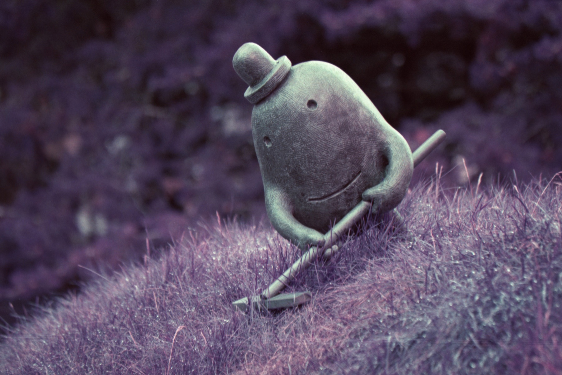 Rockman figure in front of the Federal Building in downtown Minneapolis, Minnesota. Captured with 35mm Purple film.