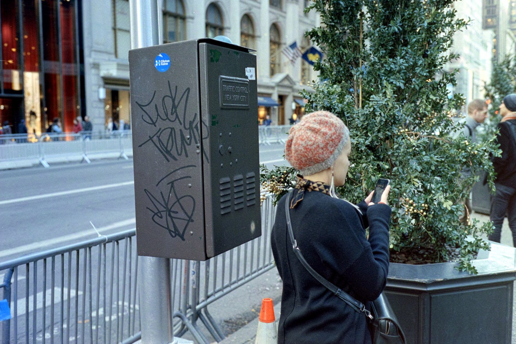 Defaced public property in front of Trump Tower.